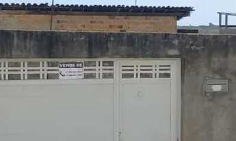 Imagem 2: Vendo um terreno com uma pequena casa