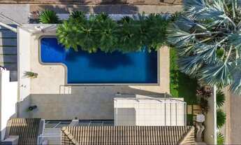 Imagem 5: Residência de alto padrão com área gourmet, piscina e sustentabilidade no Alto dos Ipês