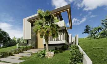 Imagem: Casa moderna, com fachada imponente, em