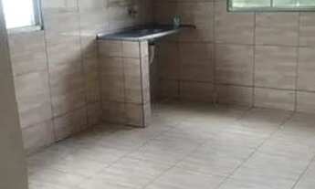 Imagem 2: Casa toda na cerâmica, com garagem coberta