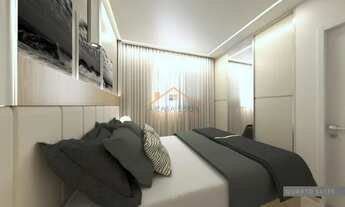 Imagem 7: Apartamento de aproximadamente 90m² total com três quartos, sala ampla, 2 vagas de garagem