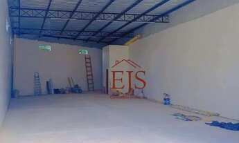 Imagem 3: Galpão com 160 m², porta automática com 5 metros de largura e 5 metros de altura para loca