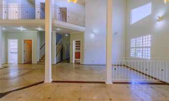 Imagem 2: A casa a venda com varanda, 5 quartos - 586 m² em condomínio Moinho de Vento por R$ 1.800