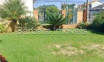 Imagem 2: CASA TRAMANDAI Casa com 4 dormitórios