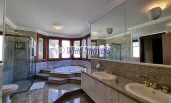 Imagem 6: Casa de condomínio térrea com 670 metros quadrados com 5 quartos