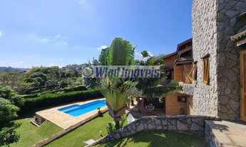 Imagem 2: Casa de condomínio térrea com 670 metros quadrados com 5 quartos