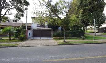 Imagem 3: Casa para Venda em Curitiba, Centro Cívico, 4 dormitórios, 1 suíte, 5 banheiros, 4 vagas