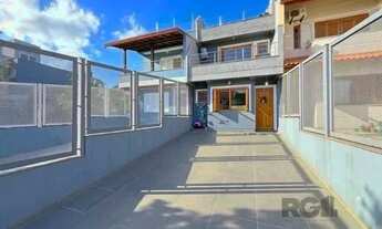 Imagem 3: Casa em Porto Alegre, no bairro Guarujá, com 3 dormitório(s), e 3 banheiros, à v