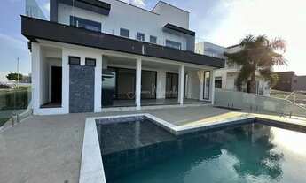 Imagem 1: Sobrado novo no Alphaville I, 452 m2, 4 suítes, piscina com vista cinematográfica, para v