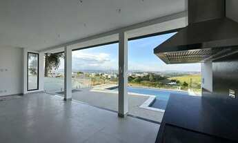 Imagem 3: Sobrado novo no Alphaville I, 452 m2, 4 suítes, piscina com vista cinematográfica, para v