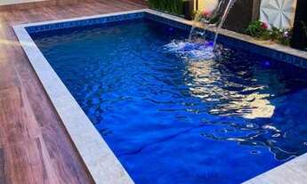 Imagem 7: Casa com 4 suítes, sendo 1 térrea, suíte master com sacada, close e hidromassagem no Jardi