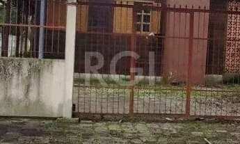 Imagem: Casa de esquina no bairro Guarujá