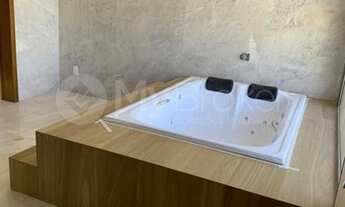 Imagem 7: Sobrado luxuoso em Condomínio Alphaville Araguaia sendo 07 quartos e 04 suítes