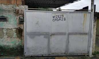 Imagem: Vendo um terreno com cozinha e um banheiro