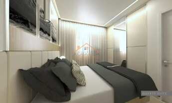 Imagem 3: Apartamento de aproximadamente 90m² total com três quartos, sala ampla, 2 vagas de garagem