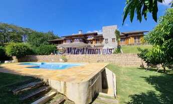 Imagem 3: Casa de condomínio térrea com 670 metros quadrados com 5 quartos