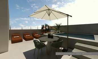 Imagem 2: Apartamento de aproximadamente 90m² total com três quartos, sala ampla, 2 vagas de garagem