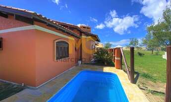 Imagem 6: Casa com piscina a duas quadras do mar contando com 03 dormitórios