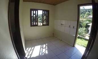 Imagem 7: Casa de 2 dormitórios e 2 kitnets em terreno de 350m² com inquilino gerando Nova Trento