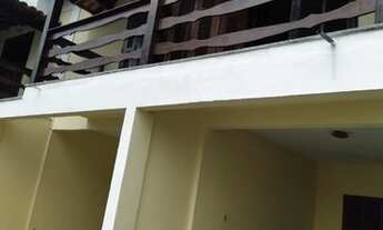 Imagem: Casa na beira da praia