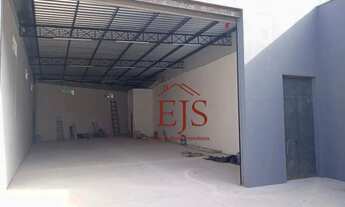 Imagem 2: Galpão com 160 m², porta automática com 5 metros de largura e 5 metros de altura para loca