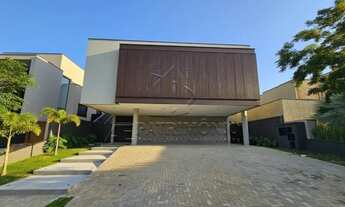 Imagem: CASA EM CONDOMINIO 4 SUÍTES SENDO 1 COM