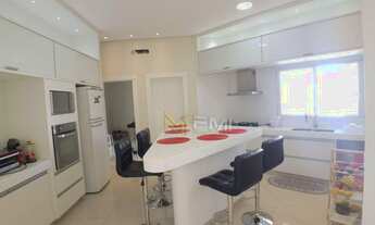 Imagem 5: Sobrado com 4 dormitórios à venda, 690 m² por R$ 2.500.000,00 - Condomínio Flamboyant - Ho