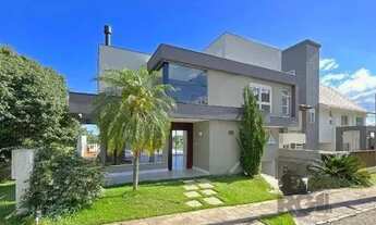 Imagem 2: Casa Condominio em Porto Alegre, no bairro Hípica, com 3 dormitório(s), e 3 banheiros, à v