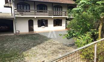 Imagem 3: Casa com 1 suíte e mais 2 quartos à venda no bairro Glória em Joinville, de R$ 790.000.00