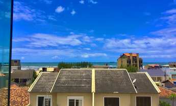 Imagem 6: Vista para o mar na sala e pôr do sol nos quartos