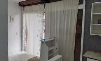 Imagem 2: Uma loja com uma quitinete