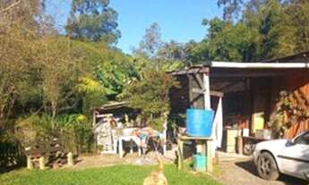 Imagem 3: Venda de terreno com casa