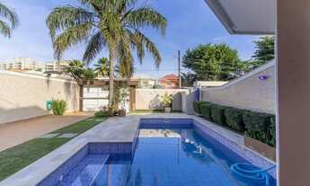 Imagem 2: Maravilhosa casa triplex, 5 suítes, excelente estado, 350 m², 5 vagas, condomínio Rio Mar