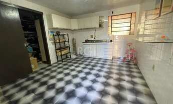 Imagem 4: Casa 5 dorm com 3 suítes, sala ampla com lareira, com área de lazer, Ipanema Porto Alegre