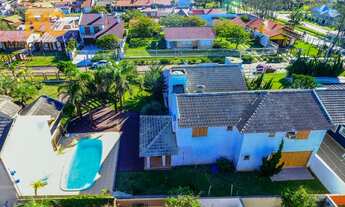 Imagem 2: Sobrado para venda tem 223 metros quadrados com 5 quartos em Centro - Imbé - RS