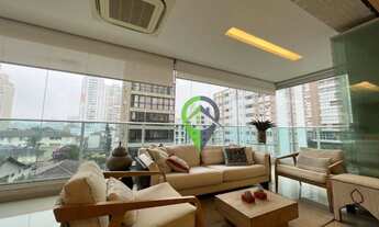 Imagem 4: DESLUMBRANTE APARTAMENTO TOTALMENTE MOBILIDADO COM 4 SUÍTES E VARANDA GOURMET