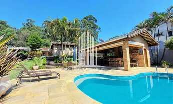 Imagem 2: Casa de 322m² com 5 quartos sendo 4 suítes, 6 vagas de garagem e 5 banheiros no Palos Verd