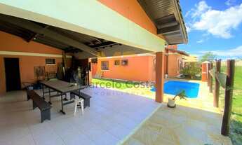 Imagem 7: Casa com piscina a duas quadras do mar contando com 03 dormitórios