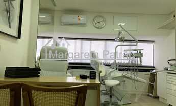 Imagem: Sala comercial decorada, porteira fechada