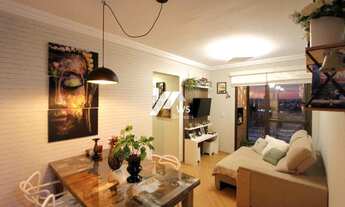 Imagem: Apartamento com sacada e churrasqueira a