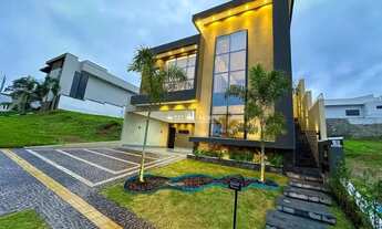 Imagem 3: Casa subtérrea com 4 suítes plenas sendo uma master com closet