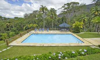 Imagem 2: Casa com privacidade em meio ao verde