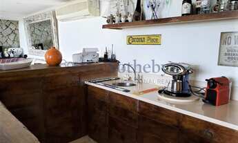 Imagem 7: Casa de condomínio na beira da praia