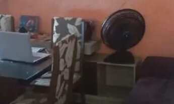 Imagem 3: Vendo três casas no mesmo quintal