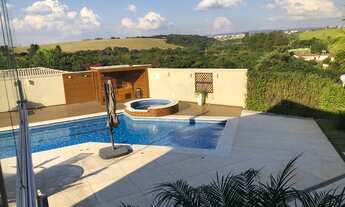 Imagem 3: Casa de condomínio térrea para venda tem 550 metros quadrados com 4 quartos