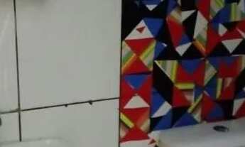 Imagem 2: Imóvel em vila familiar