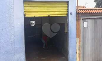 Imagem 2: Casa térrea com comércio conjugado. Terreno conta com 260 metros quadrados. Acasa tem gara