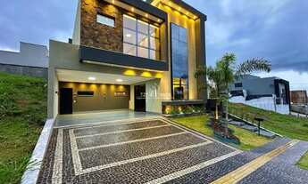 Imagem 2: Casa subtérrea com 4 suítes plenas sendo uma master com closet