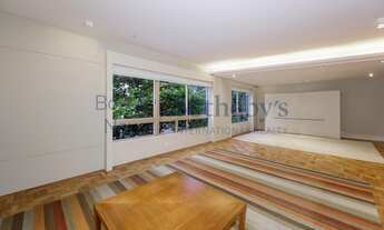 Imagem 2: Apartamento em rua tranquila e arborizada