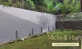 Imagem 4: Desfrute da natureza no jardim e da diversão na piscina com a família